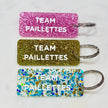 TEAM PAILLETTES  Porte-clés à paillettes Plus de Love