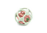Balle sensorielle verte et rose