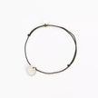 Bracelet croix noir doré