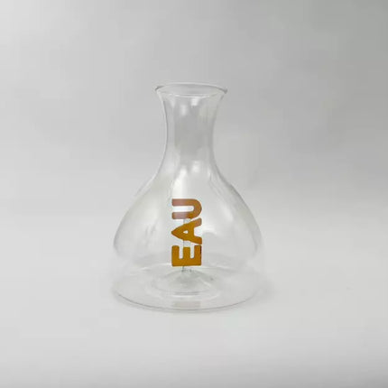 carafe en verre transparent avec ecriture eau couleur ambre 