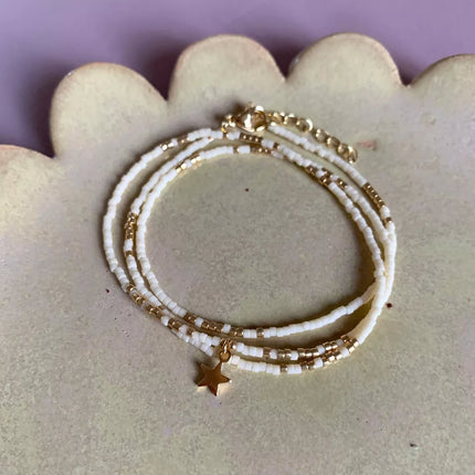 Collier écru avec pendentif étoile