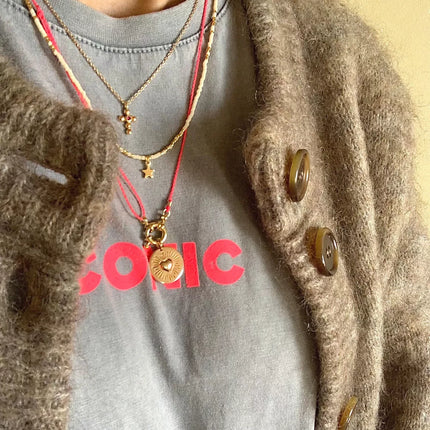 Collier écru avec pendentif étoile