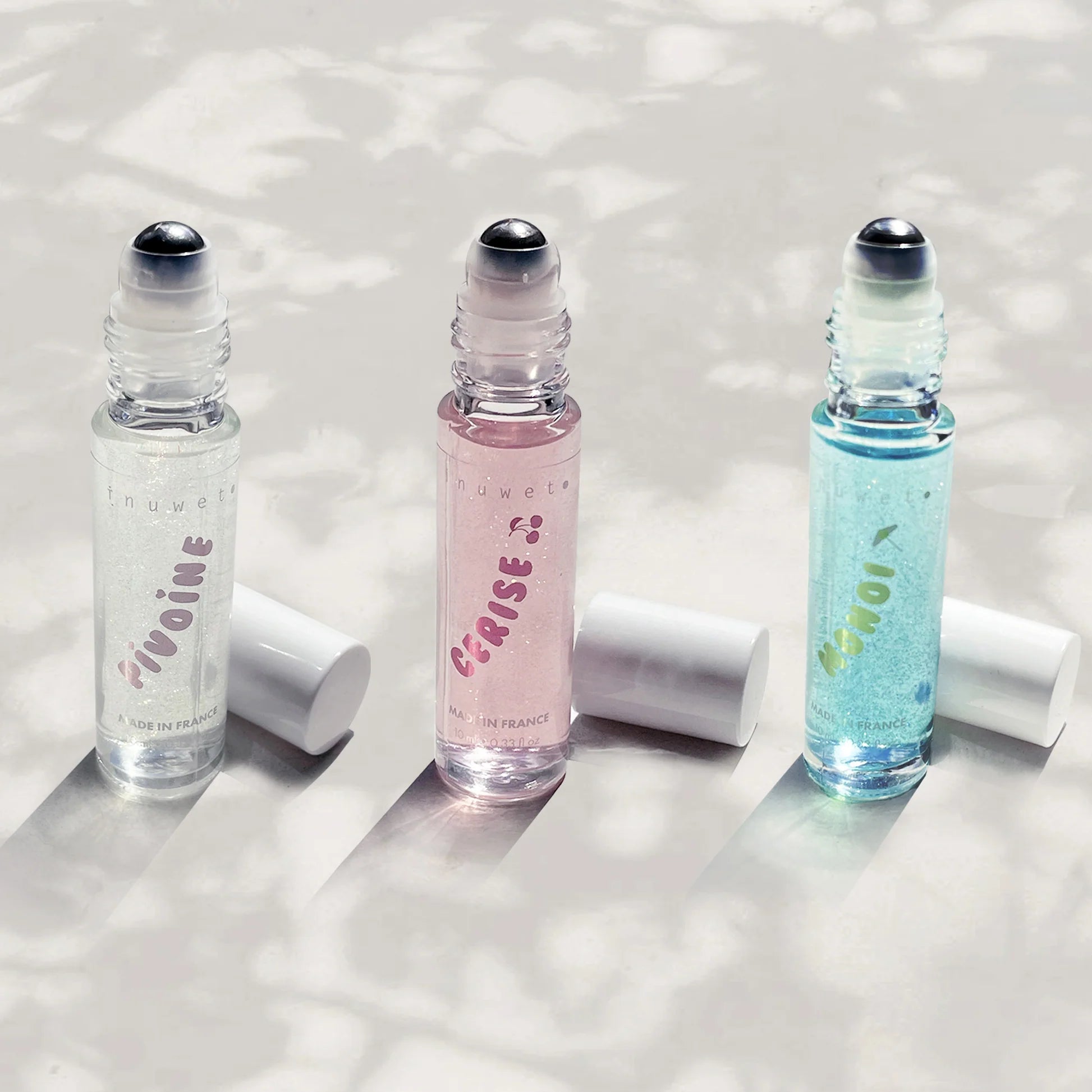 Parfum roll on pivoine, cerise et monoï pailletes 