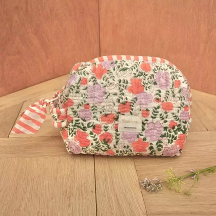 trousse de toilette rose et violette