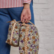 trousse de toilette fleurie violette 