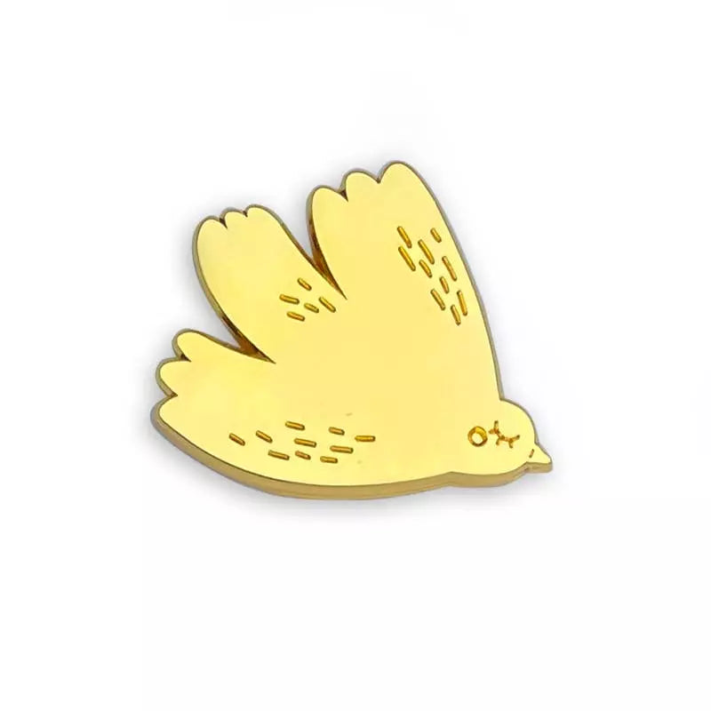 Pin's colombe doré 