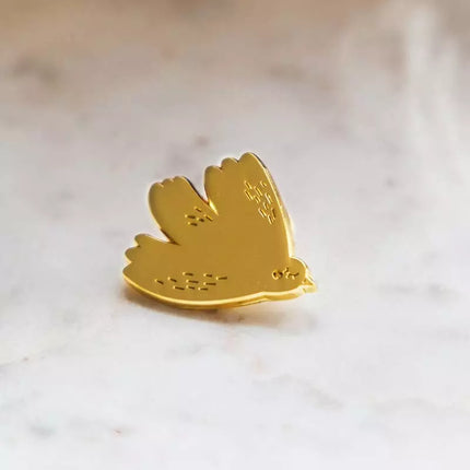 Pin's colombe doré 