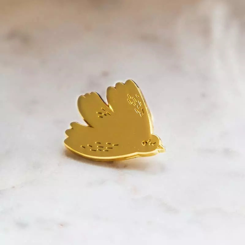 Pin's colombe doré 