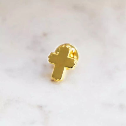 Pin's croix doré 