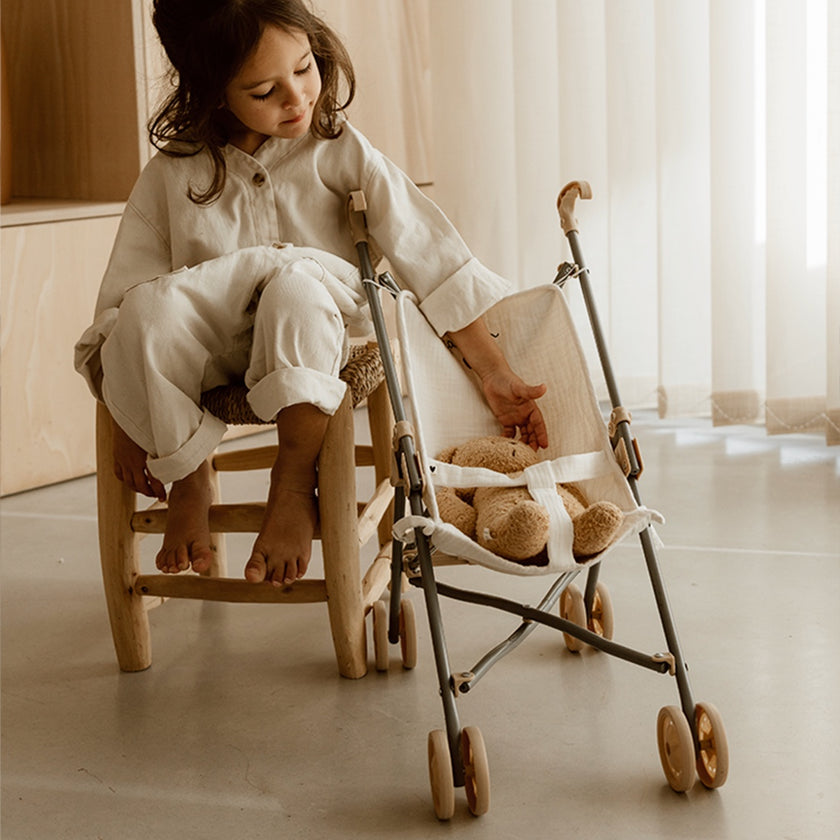 poussette moumoute blanche