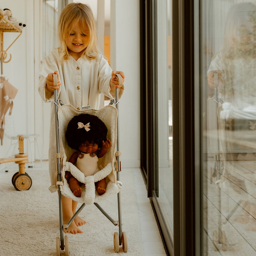 poussette moumoute blanche