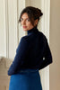 Pull col roulé bleu marine