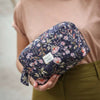 trousse de toilette bleu marine fleurie