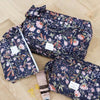 trousse de toilette bleu marine fleurie